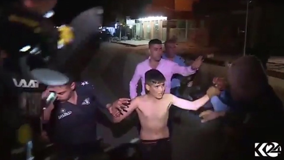 Two policemen had held the boy's arms to prevent him detonating the vest while another had the delicate task of untying the explosive belt