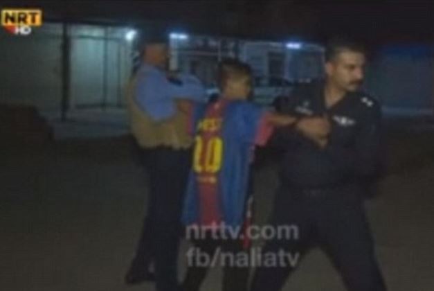 The boy was wearing a Barcelona shirt with Lionel Messi's number ten on the back when he was first stopped by officers