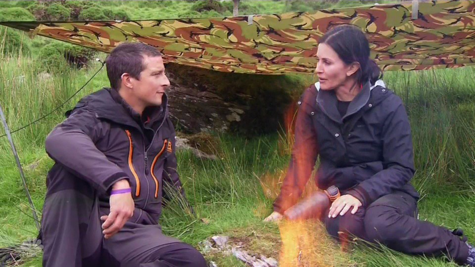 Courteney Cox freaks out over eating rotting sheep and descending a cliff on Running Wild with Bear Grylls