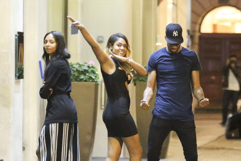 One girl does Usain Bolt's trademark celebration back at his plush hotel
