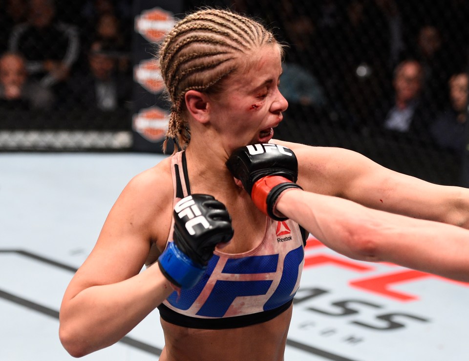 Paige VanZant in Octagon action against Rose Namajunas