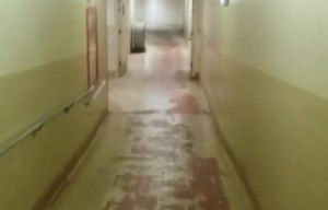 Could you walk down this creepy corridor every night? Video of a 'haunted' block of flats is freaking out…