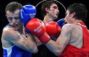 Decision to ditch headguards put under the spotlight as two boxers suffer nasty cuts
