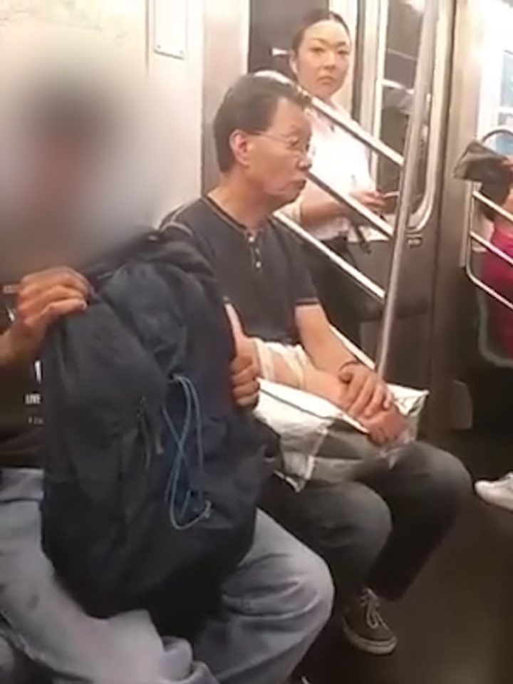 The man stays silent while being told off but nods slightly when the woman asks him if he understands