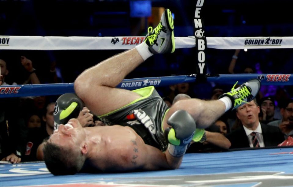 ARLINGTON, TX - SEPTEMBER 17: Liam Smith grimaces after being knocked down by Canelo Alvarez during the WBO Junior Middleweight World fight at AT&T Stadium on September 17, 2016 in Arlington, Texas. (Photo by Ronald Martinez/Getty Images)