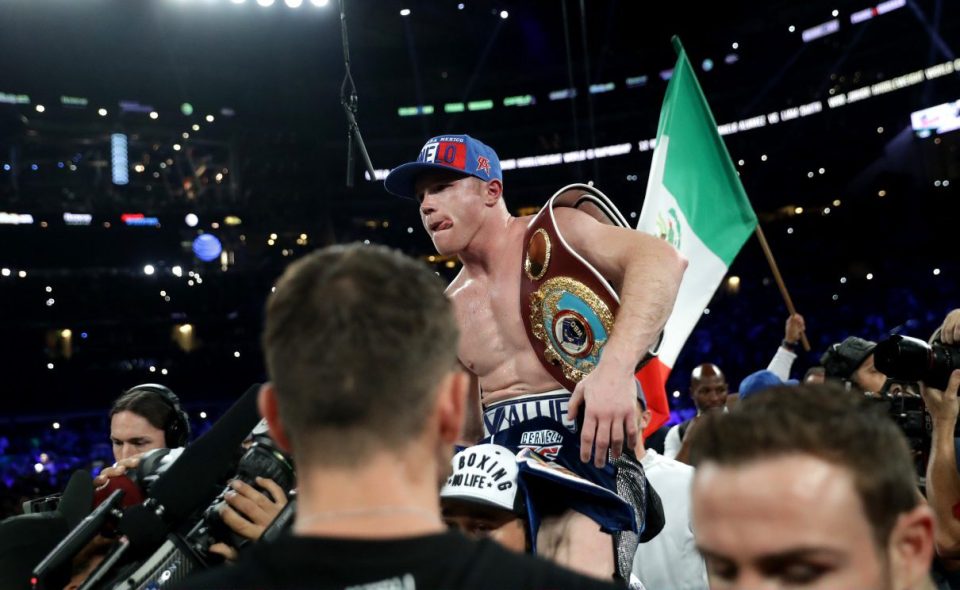 ARLINGTON, TX - SEPTEMBER 17: Canelo Alvarez celebrates after knocking out Liam Smith during the WBO Junior Middleweight World fight at AT&T Stadium on September 17, 2016 in Arlington, Texas. (Photo by Ronald Martinez/Getty Images)