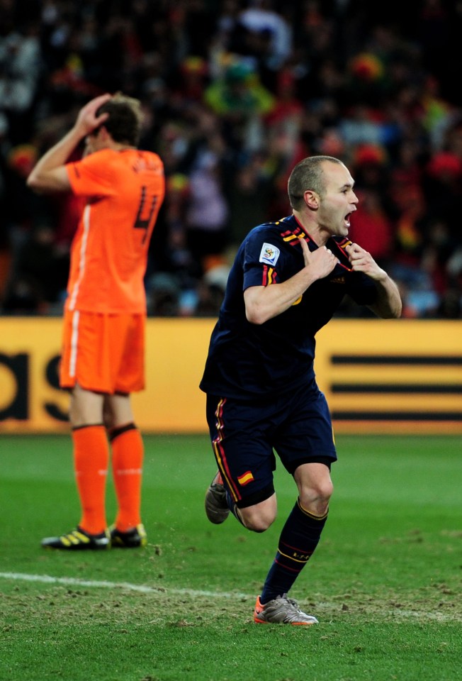JOHANNESBURG, SOUTH AFRICA - JULY 11: Andres Iniesta of Spain celebrates scoring his side's first goal during the 2010 FIFA World Cup South Africa Final match between Netherlands and Spain at Soccer City Stadium on July 11, 2010 in Johannesburg, South Africa. (Photo by Jamie McDonald/Getty Images)