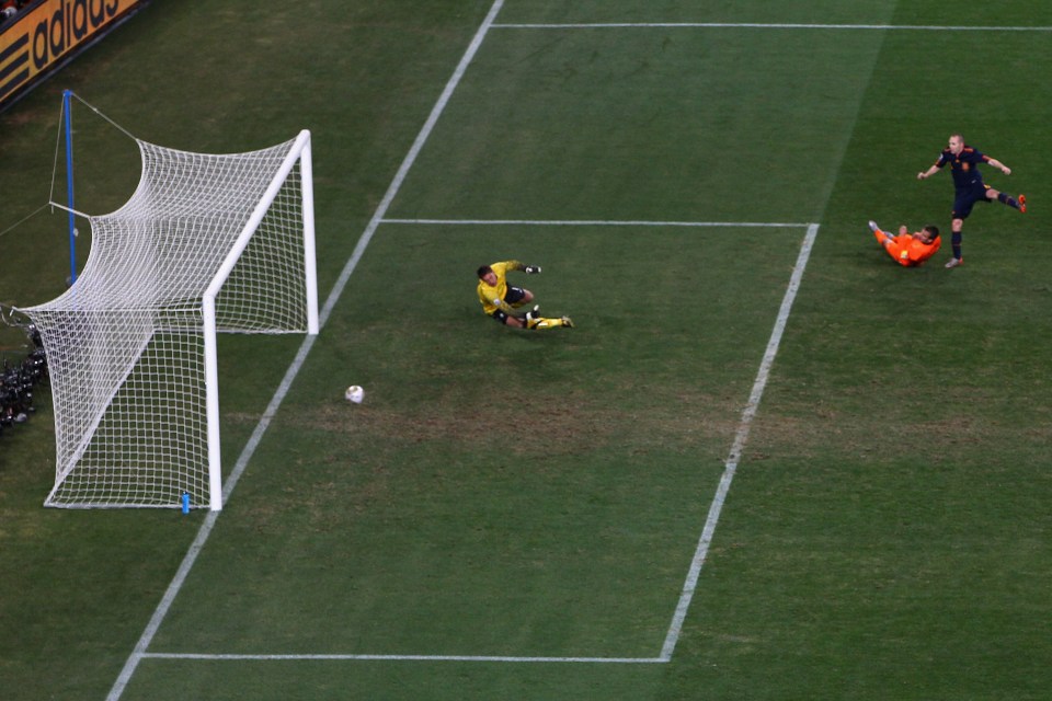 JOHANNESBURG, SOUTH AFRICA - JULY 11: Andres Iniesta of Spain scores the winning goal during the 2010 FIFA World Cup South Africa Final match between Netherlands and Spain at Soccer City Stadium on July 11, 2010 in Johannesburg, South Africa. (Photo by Michael Steele/Getty Images)