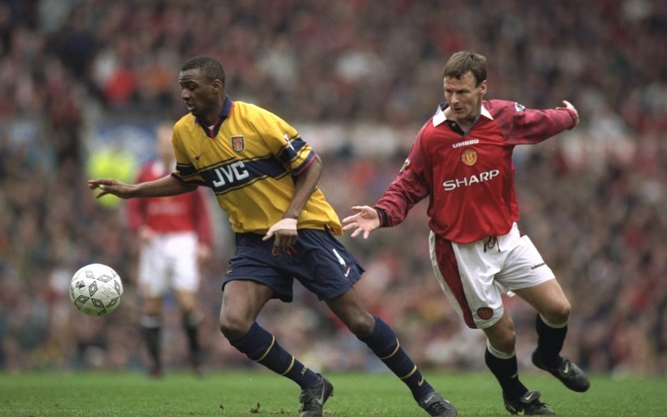 14 Mar 1998: Patrick Vieira (left) of Arsenal gets away from Teddy Sheringham of Manchester United during an FA Carling Premiership match at Old Trafford in Manchester, England. Arsenal won the match 1-0. Mandatory Credit: Shaun Botterill/Allsport
