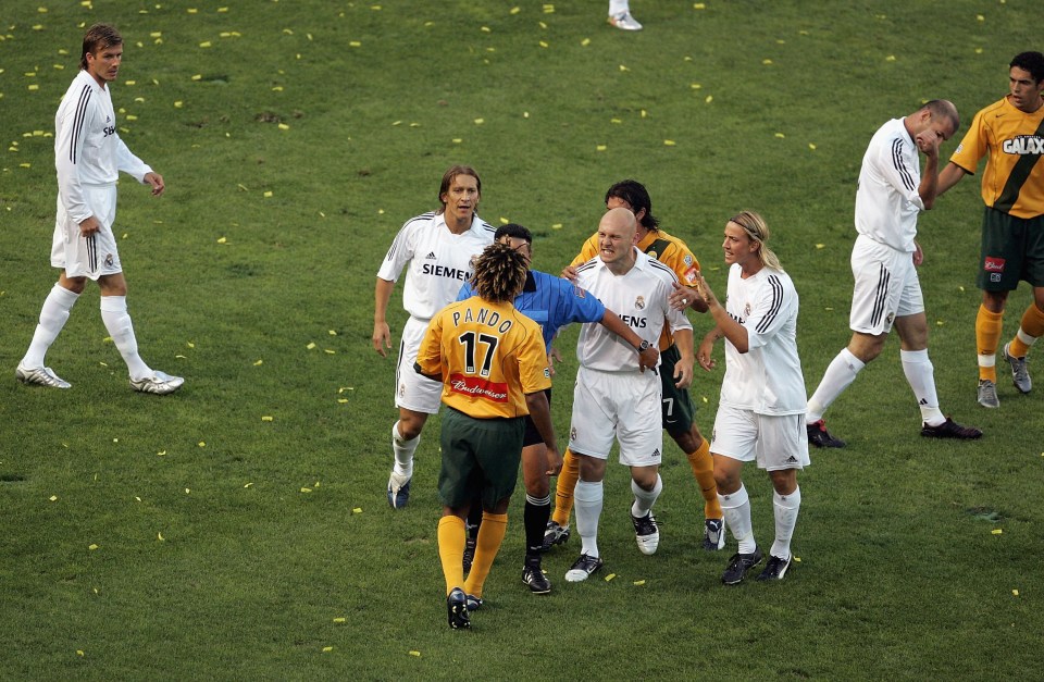 CARSON, CA - JULY 18: Thomas Gravesen #16 (C) of Real Madrid and Guillermo Ramirez #17 of the Los Angeles Galaxy argue after Ramirez fouled two Madrid players during the start of the game at the Home Depot Center on July 18, 2005 in Carson, California. (Photo by Stephen Dunn/Getty Images)