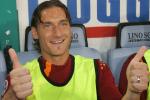 Rome, ITALY: AS Roma captain, forward Francesco Totti sits on the bench during AS Roma vs Inter Milan's, a first leg final of Coppa Italia football match, at Olympic stadium in Rome 03 May 2006. AFP PHOTO / ALBERTO PIZZOLI (Photo credit should read ALBERTO PIZZOLI/AFP/Getty Images)