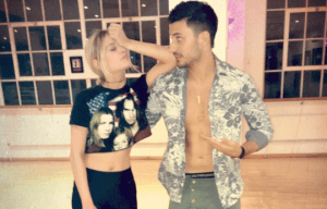Laura Whitmore and Giovanni Pernice show off their impressive abs after 'tough' training session