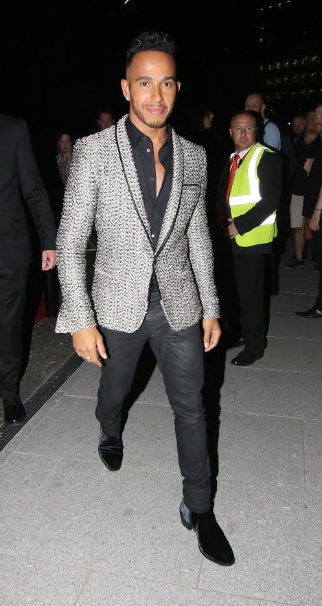 Lewis Hamilton leaving the GQ Awards at the Tate Modern last night 