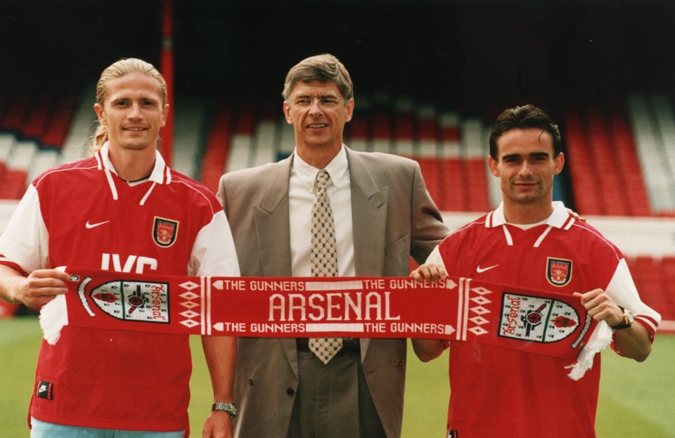 Arsenal manager Arsene Wenger introduces new signings Emmanuel Petit and Marc Overmars to the media. Negative number 1996-992-st3(27a).