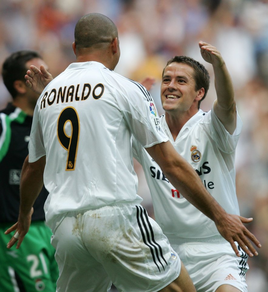 Real Madrid's Briton Michael Owen (R) jubilates with Ronaldo after he scored during their Liga match Real Madrid between Racing Santander in Santiago Barnabeu stadium in Madrid 07 May 2001. AFP PHOTO PHILIPPE DESMAZES(Photo credit should read PHILIPPE DESMAZES/AFP/Getty Images)