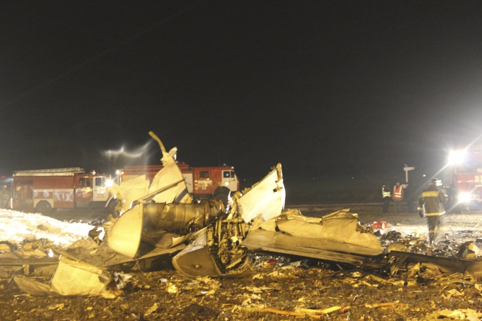 Wreckage is seen at the site of a Tatarstan Airlines Boeing 737 crash at Kazan airport