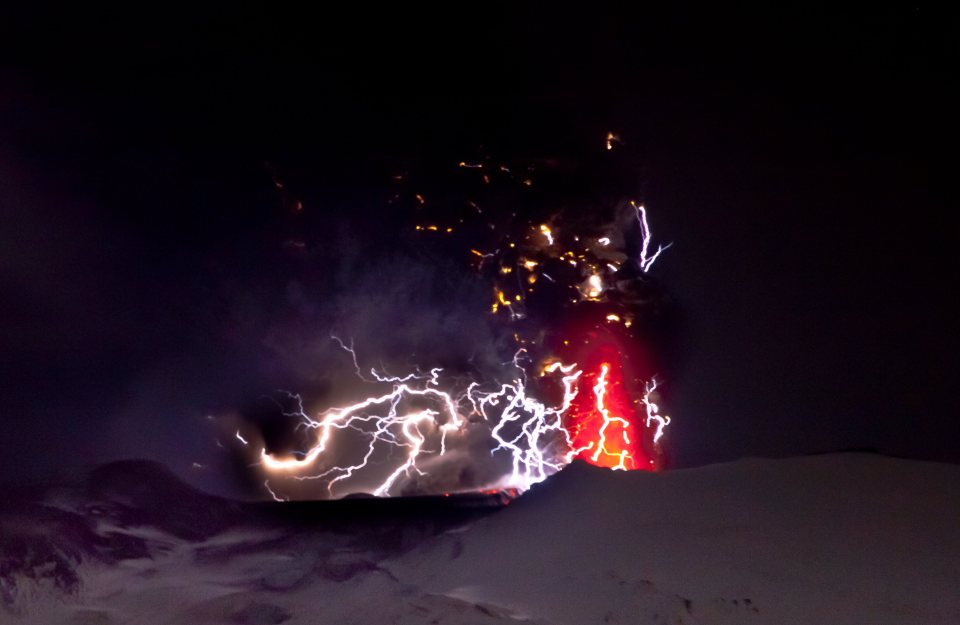 Lightning is seen within a cloud of volcanic matter as it rises from the erupting Eyjafjallajokull volcano in 2010