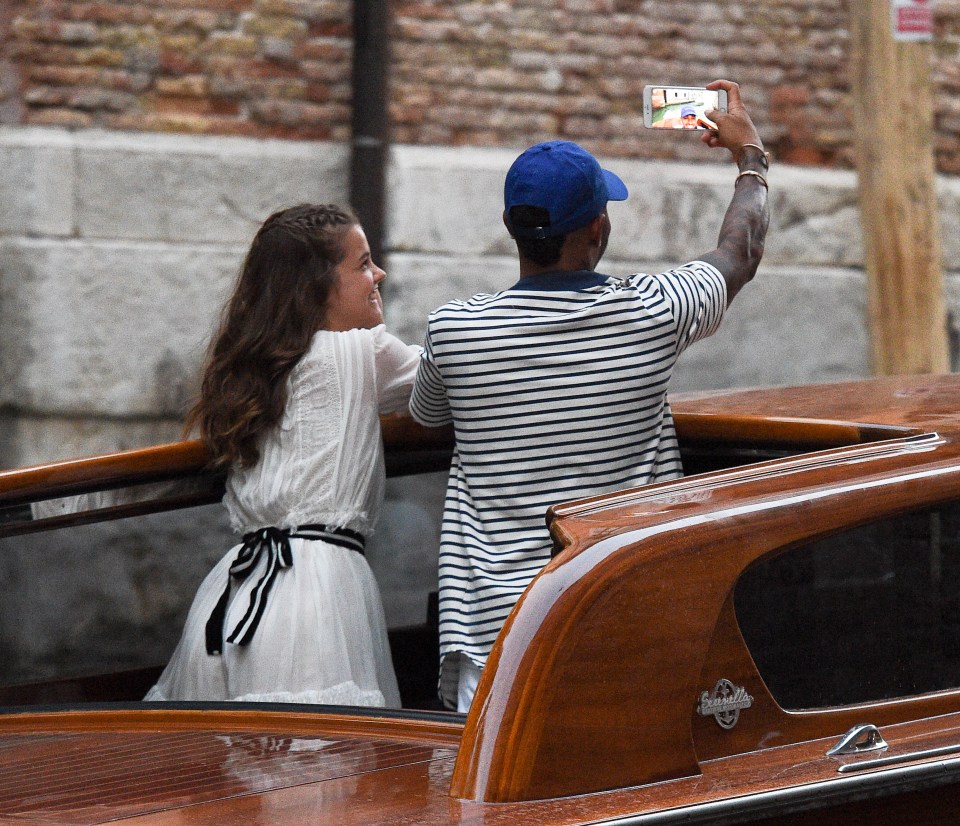 Lewis Hamilton looks loved up as he is seen on a romantic getaway in Venice with Barbara Palvin.