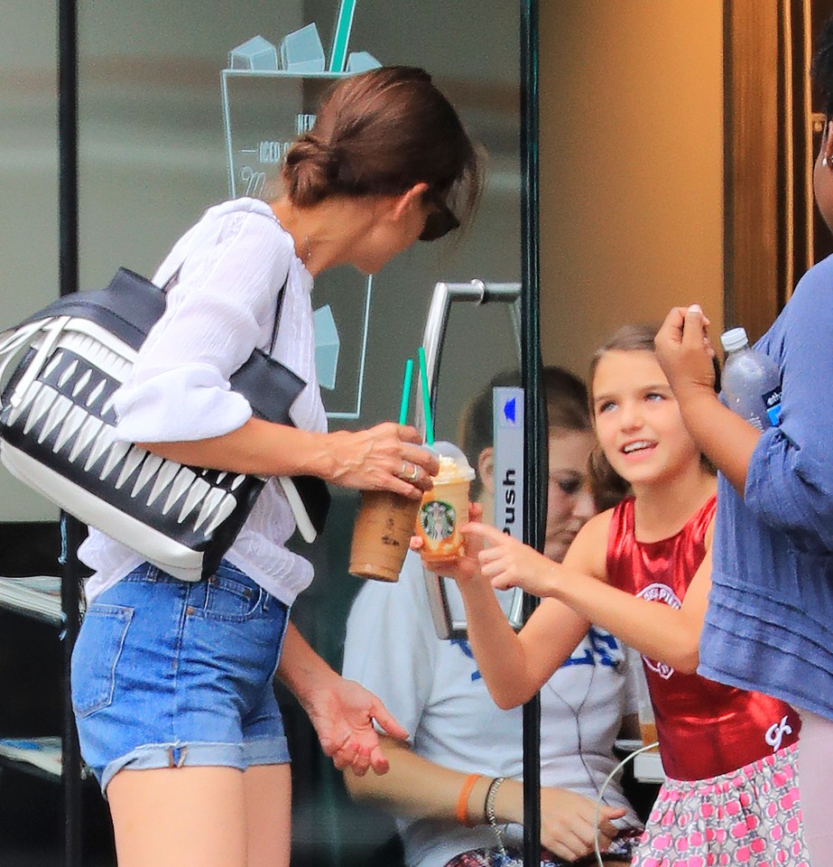 EXCLUSIVE: Katie Holmes and Suri Cruise are all smiles when going to Starbucks to get some coffee and frappucinos in New York