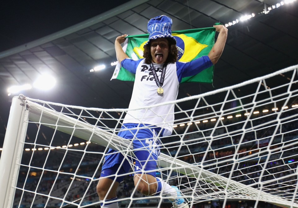 Luiz celebrates after winning the Champions League with the club in 2012