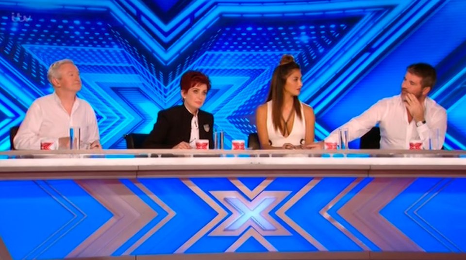 Simon reached out to comfort Nicole as she cried 