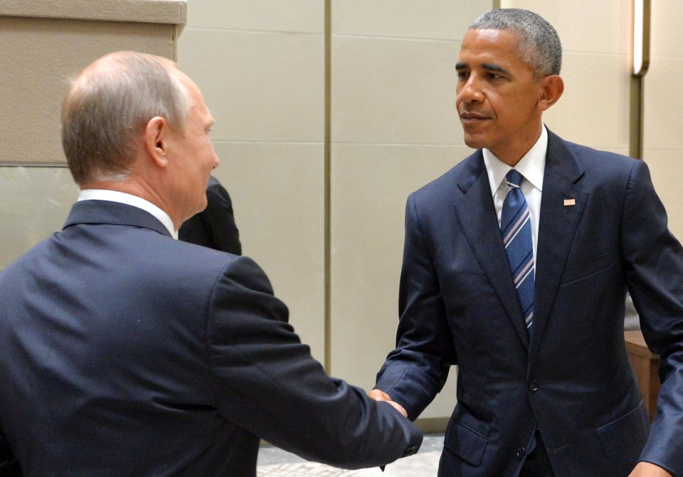 Smirk ... Smiling Putin met Obama on the sidelines of the G20 summit taking place in China