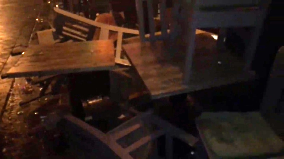 Mess ... Chairs and tables littered the old town's alleyways after several fights between England fans and Slovak supporters