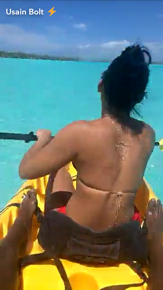 The pair explore Bora Bora by paddle boat