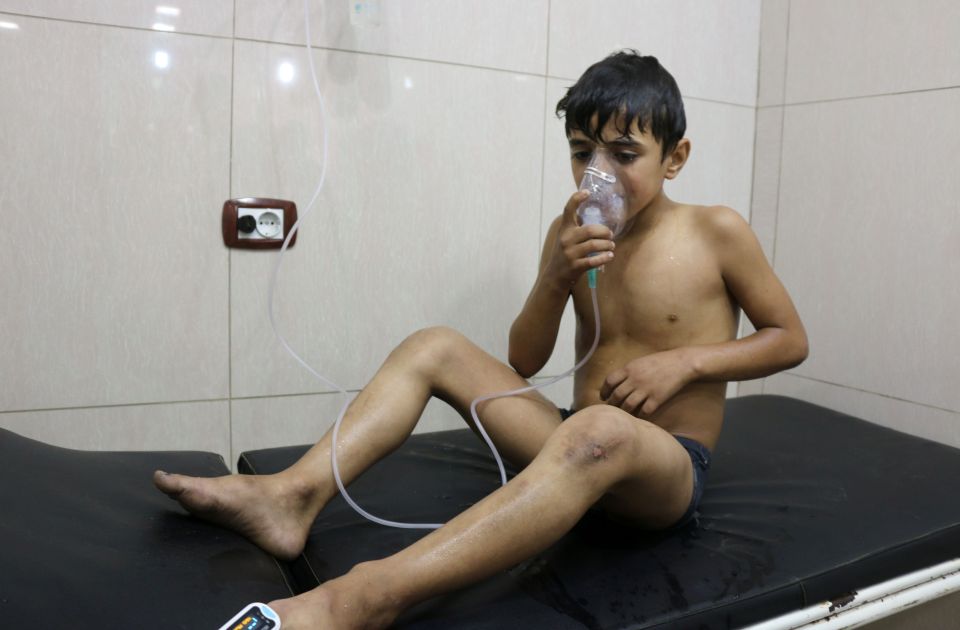 A Syrian boy with breathing difficulties is treated at a hospital in Aleppo