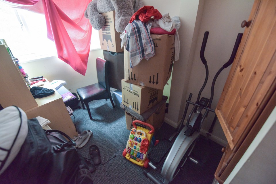 Cameroon-born student uses one room as a gym/study in his current home