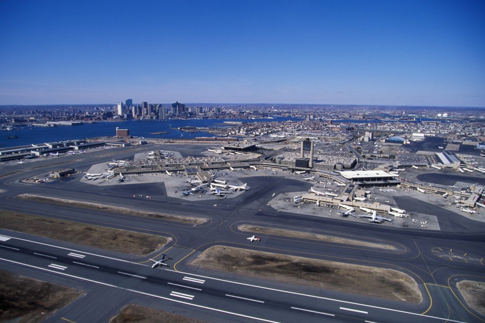 The 'unruly' passenger was arrested after landing at Logan International Airport in Boston (pictured)