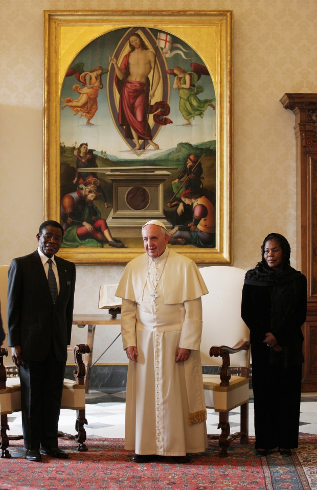 Mbasogo, pictured Pope Francis, portrays himself as being a God-like figure