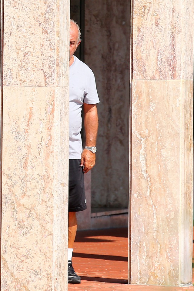 Sir Philip Green - branded 'Sir Shifty' - tried hiding from photographers in Monaco