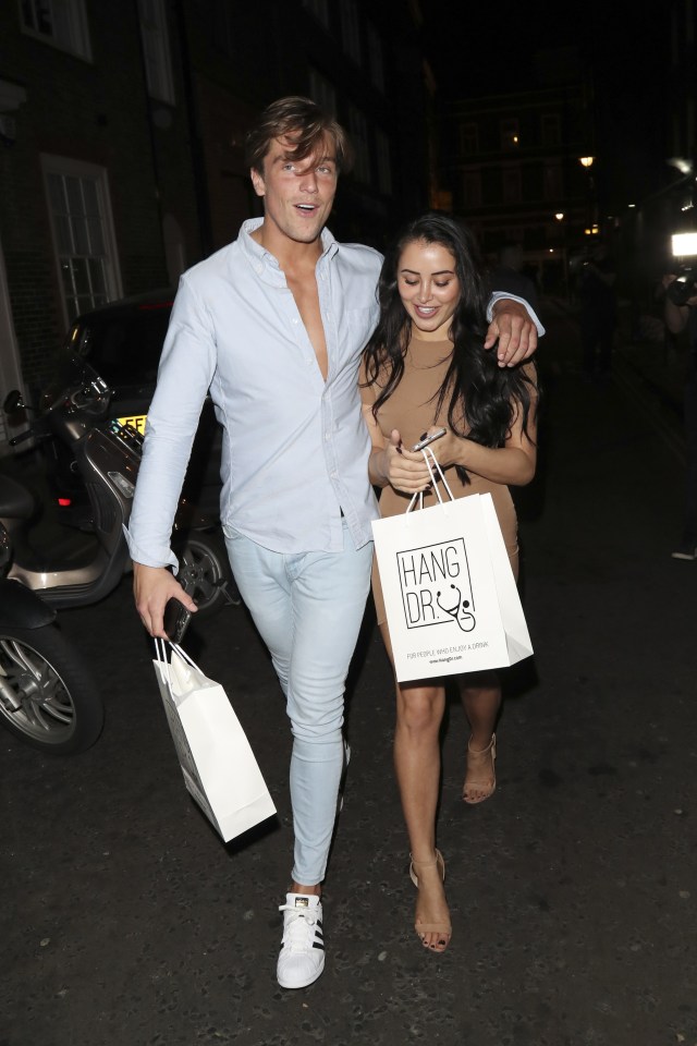 Lewis put his arm protectively around Marnie as they headed home