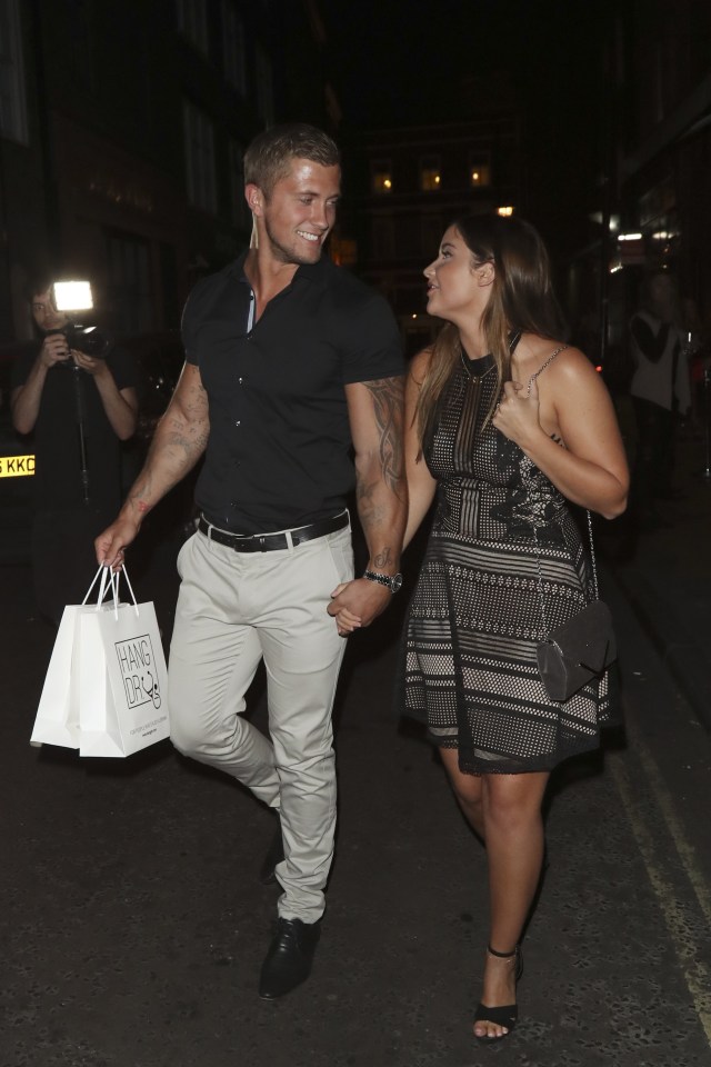 Dan and Jacqueline looked loved up as they left the party