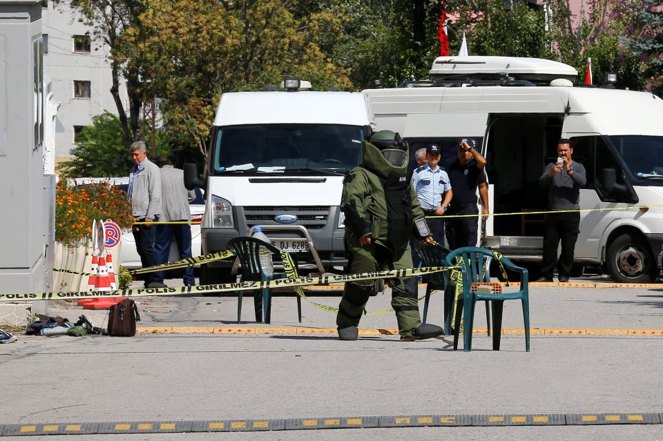 A bomb disposal expert prepares to examine a bag in front of the Israeli Embassy in Ankara