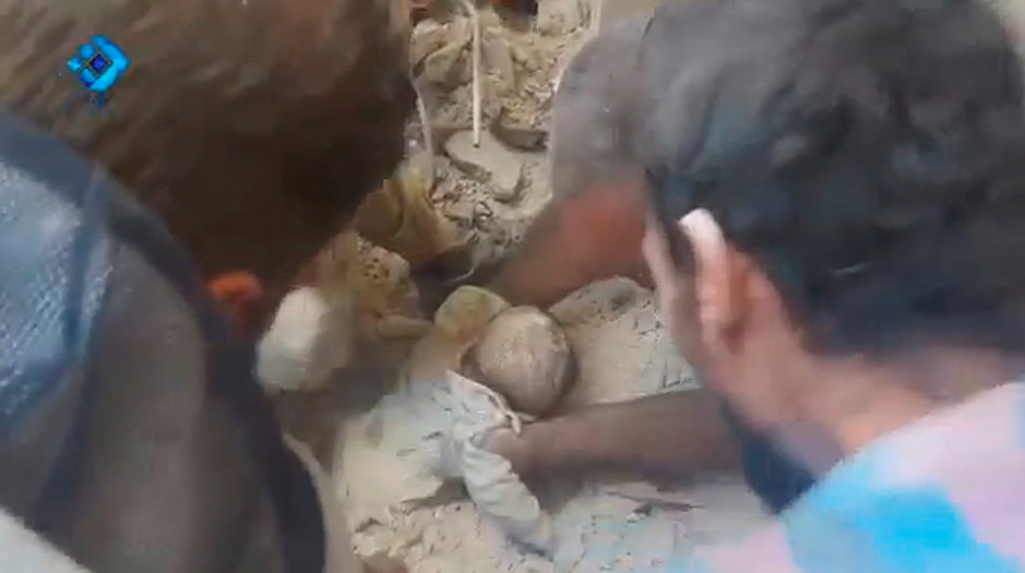 A baby was found by rescue crews after the city of Aleppo was hit by 600 airstrikes in three days