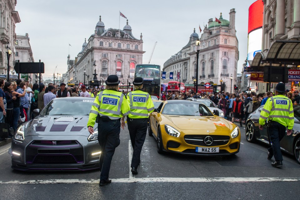 More than a dozen supercars descended on London's Piccadilly Circus on Saturday
