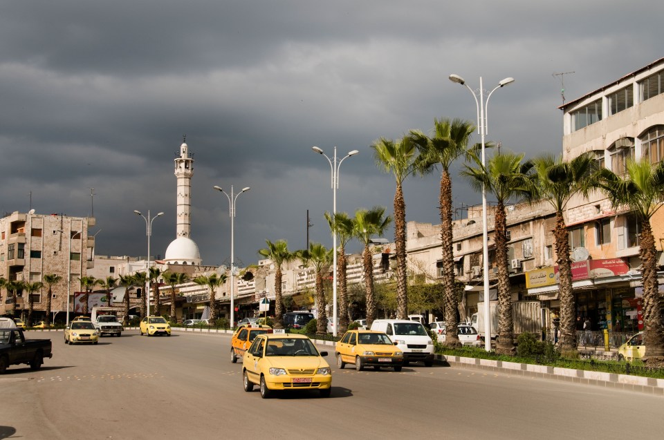 Hama Syria old new traffic taxi street city town