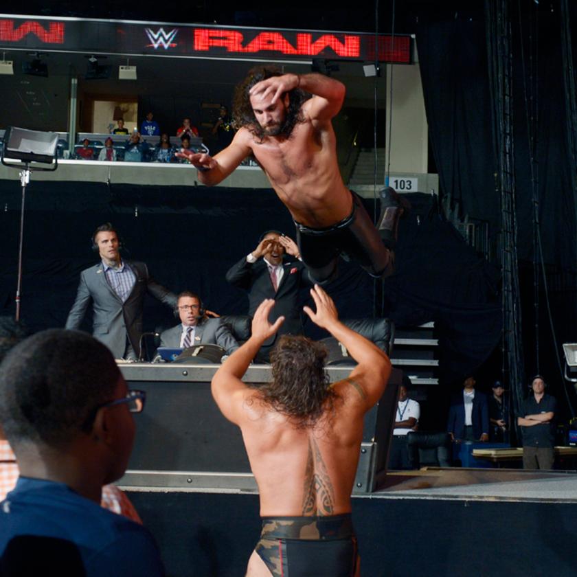 Seth Rollins dives onto Rusev
