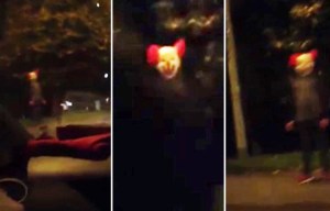 Village on alert after schoolboy films evil looking clown lurking near roadside in dead of night