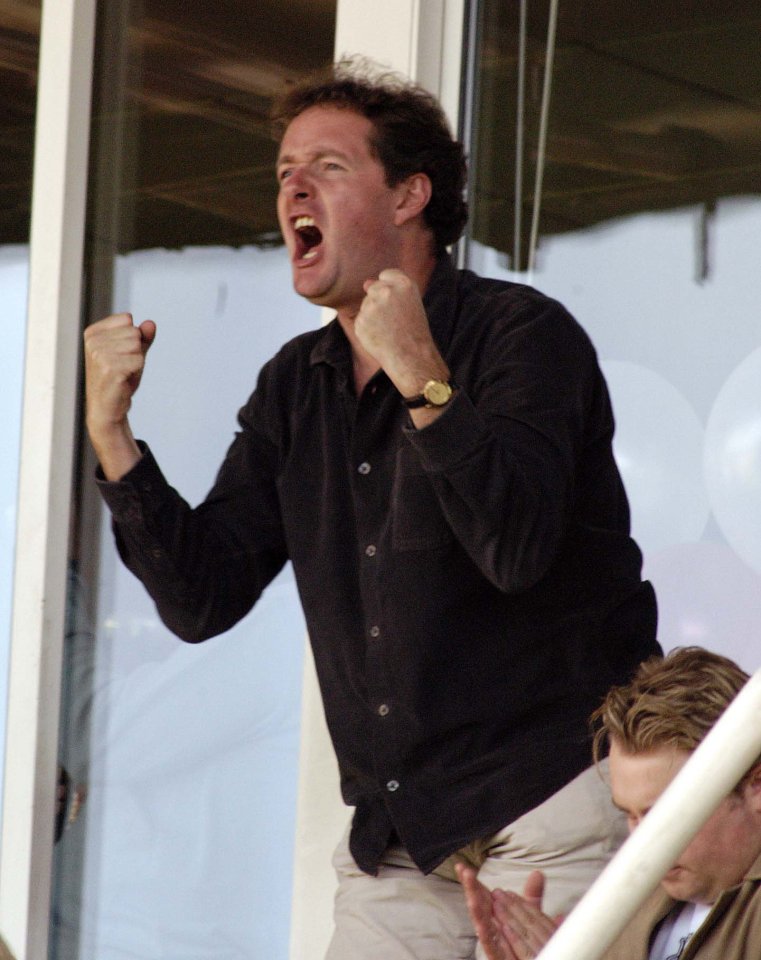 Piers Morgan celebrates as he watches his beloved Arsenal 