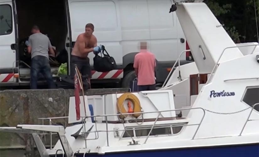 More than £100,000 worth of Eastern European guns being offloaded from a boat near Cuxton Marina, outside Rochester in Kent