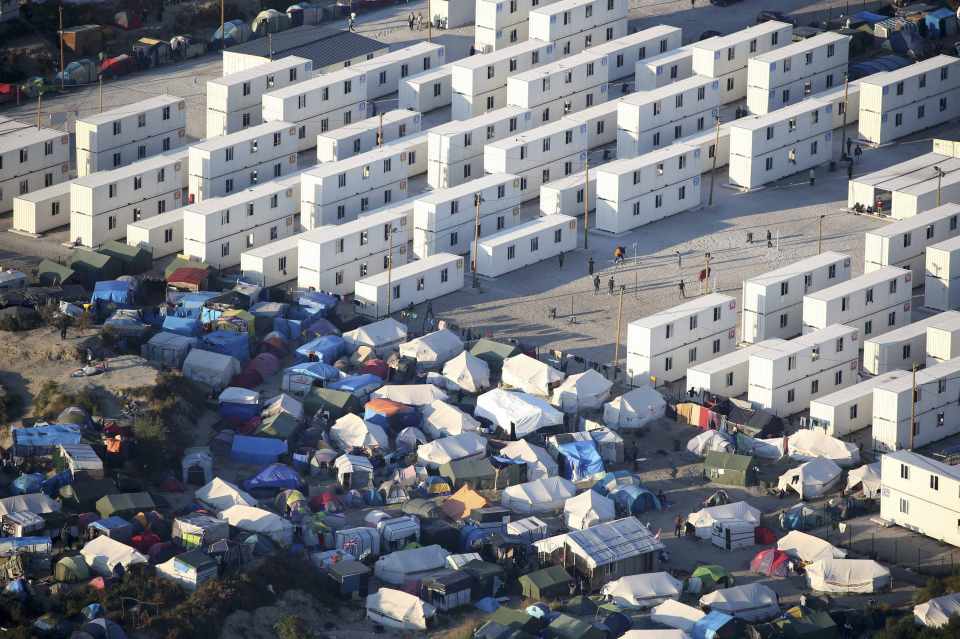 Allegations of violence . . . British lorries face threat as crowds of migrants hurry to leave camp