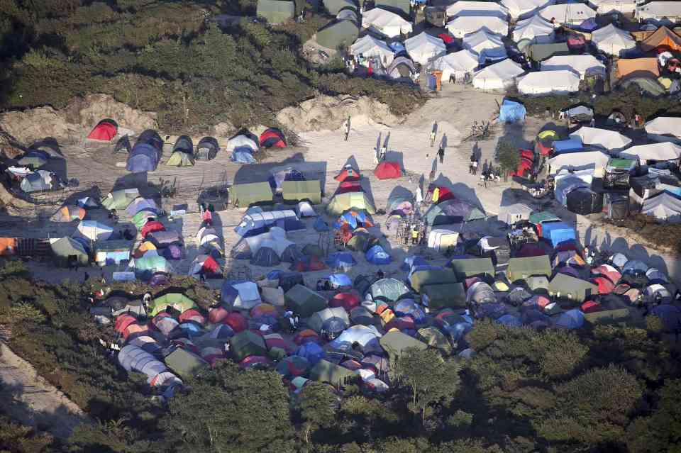 New start . . . migrants will be moved from the Calais Jungle to centres across France