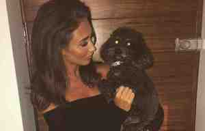 Megan McKenna is reunited with her beloved dog as she comes home following Pete Wicks sexting scandal