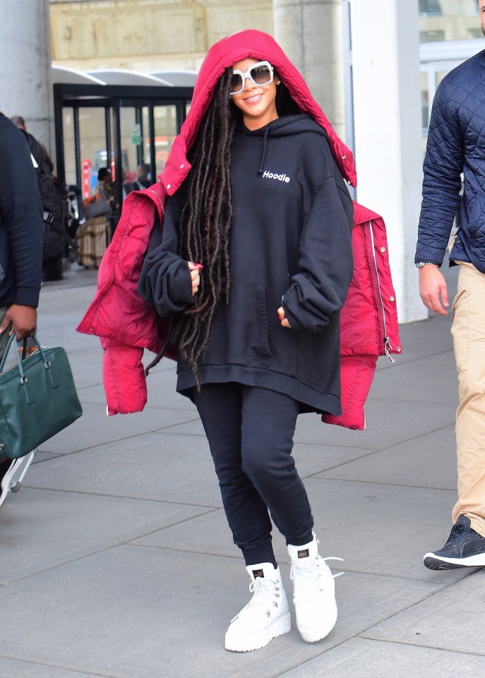 EXCLUSIVE: **PREMIUM EXCLUSIVE RATES APPLY ** Rihanna Lands Safely in NYC with Hip Length Dreads after Flying Out of Paris Immediately