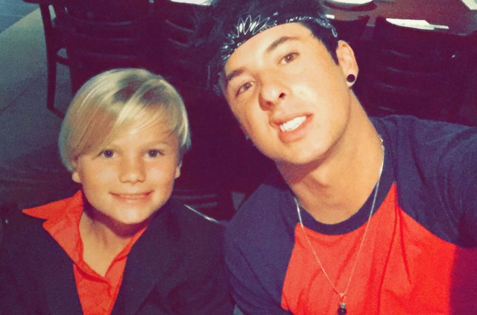  Jayk poses for a picture with Briana's little brother Austin