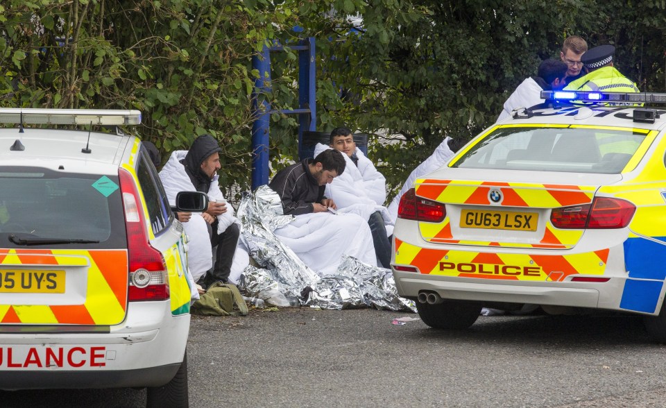 Police descended onto Clackett Lane after the driver found the group in the HGV