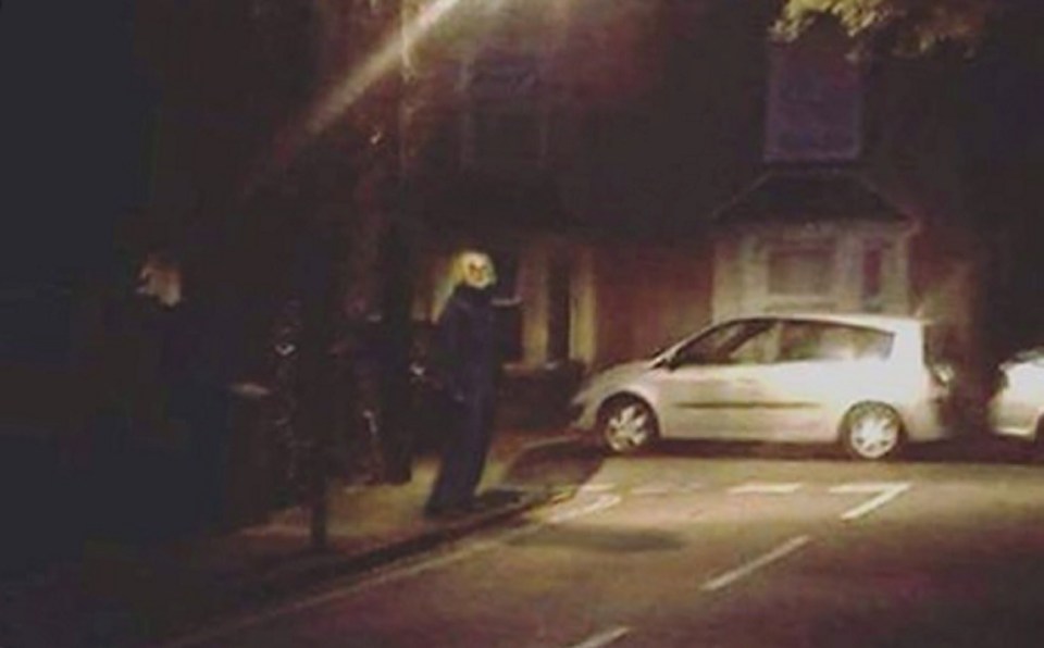 Creepy clowns wielding knives and hatchets are terrorising Brits in the run up to Halloween - here a clown is pictured in Crawley